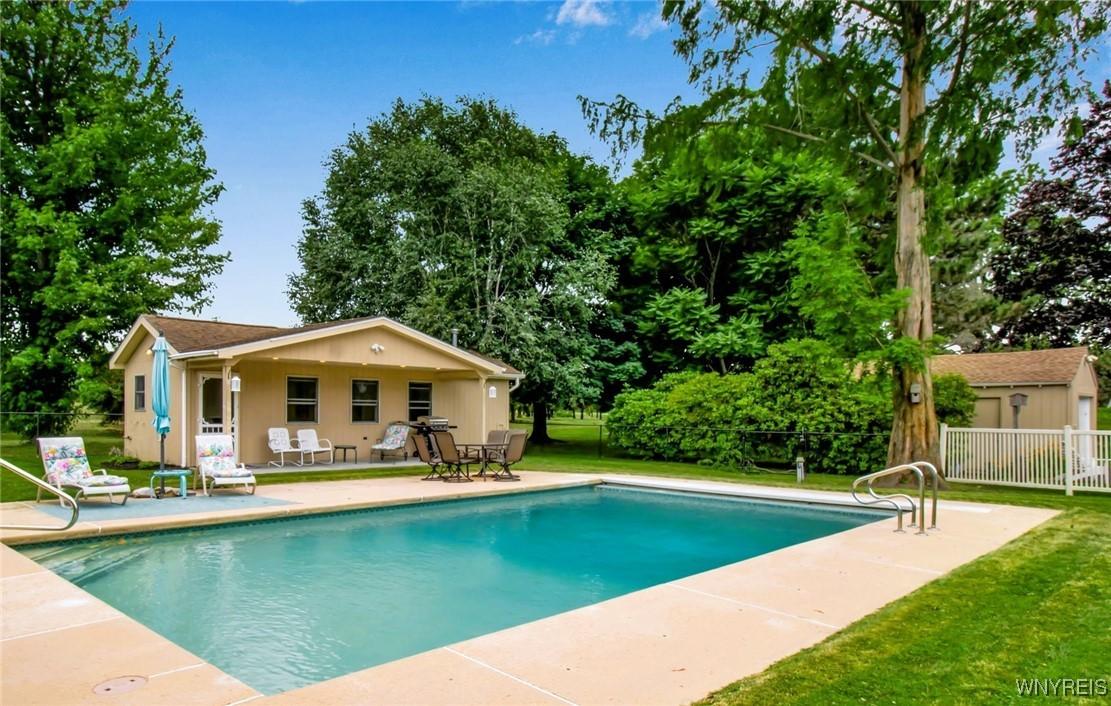Image 4: Inground Pool with guest house.