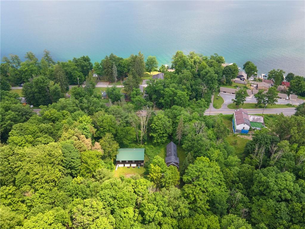 Image 2: Aerial view of Barn and house to the right and acr