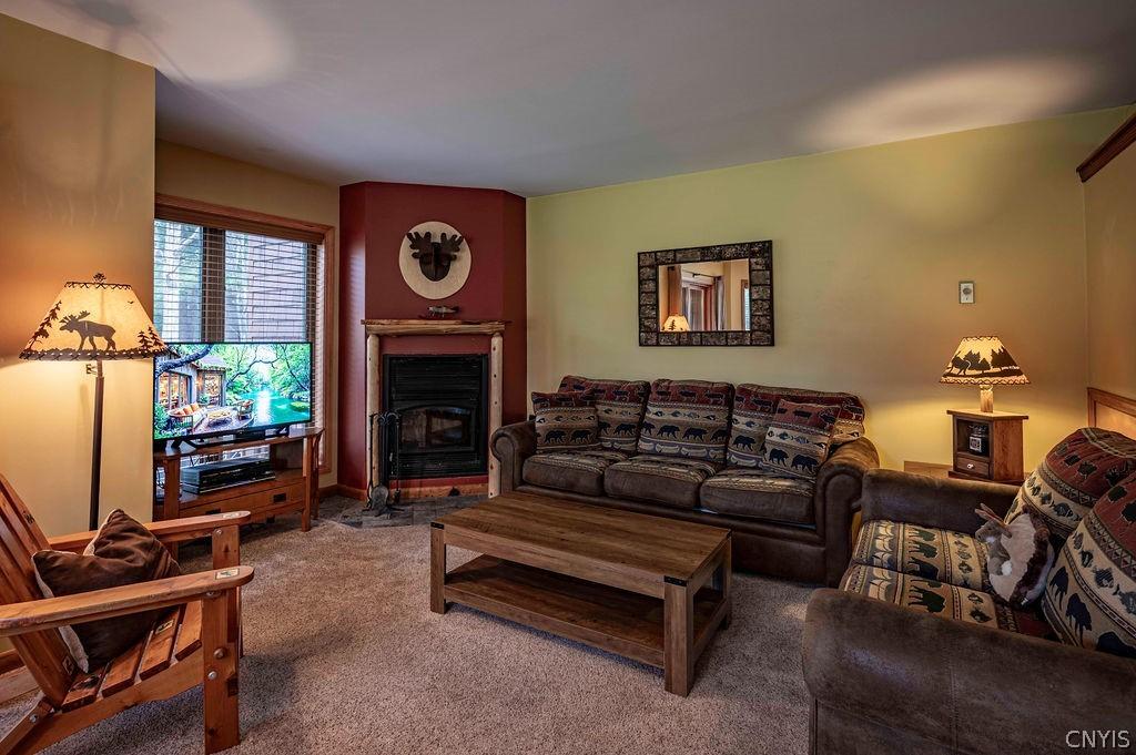 Image 3: Great Room with Wood Burning Fireplace
