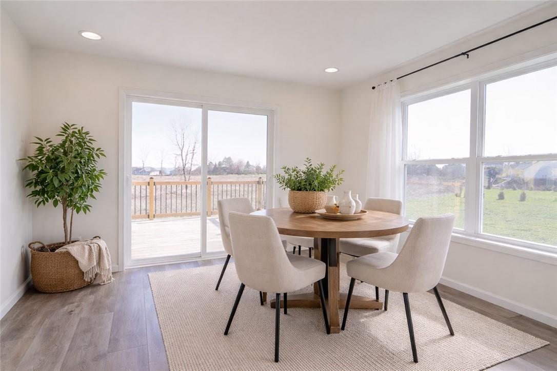 Image 4: Dining Area off of the kitchen leading to back dec