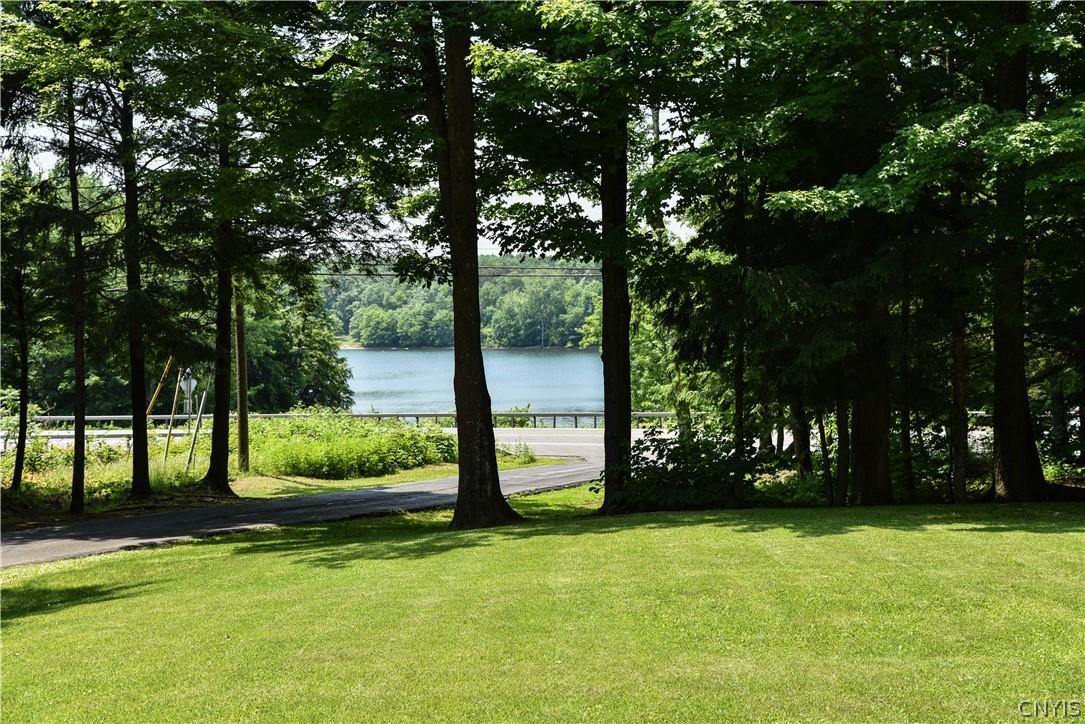 Image 2: Front yard view - lake across street