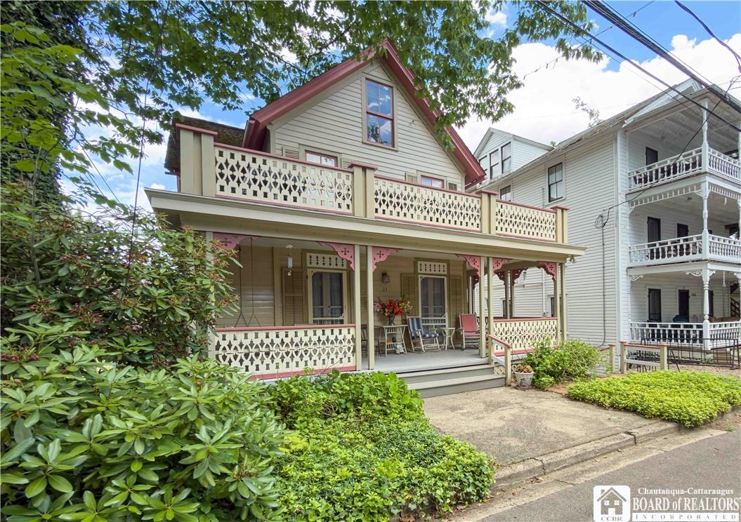 Image 3: The home is all about the porches and can be lived