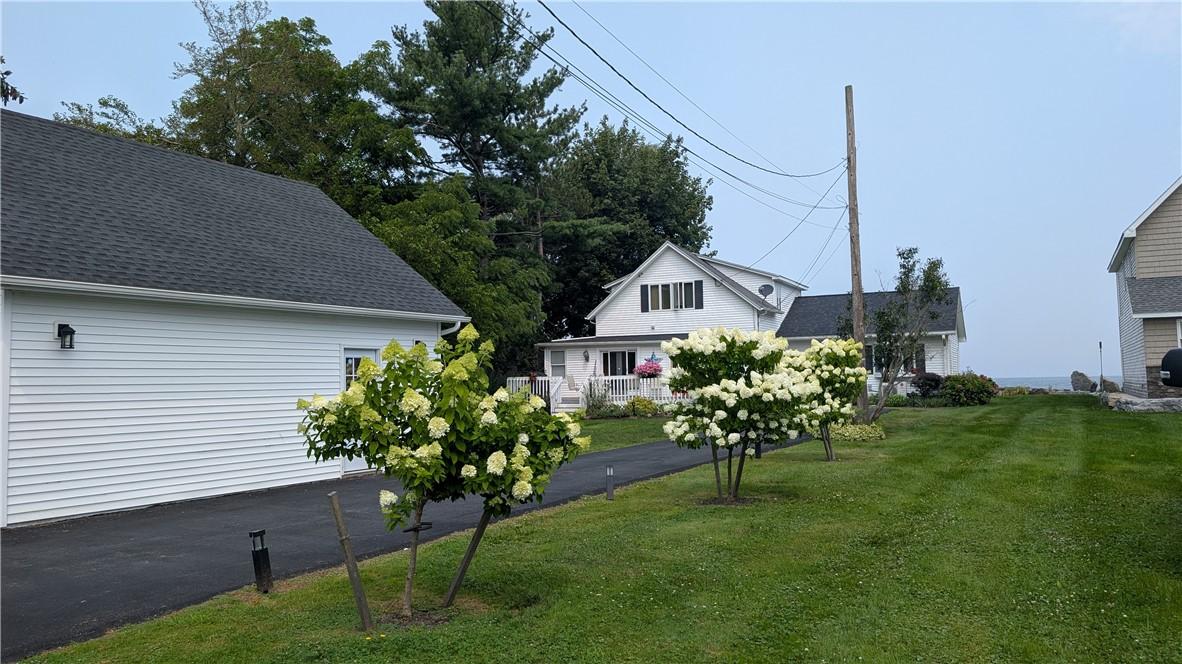 Image 2: Meticulously landscaped and maintained