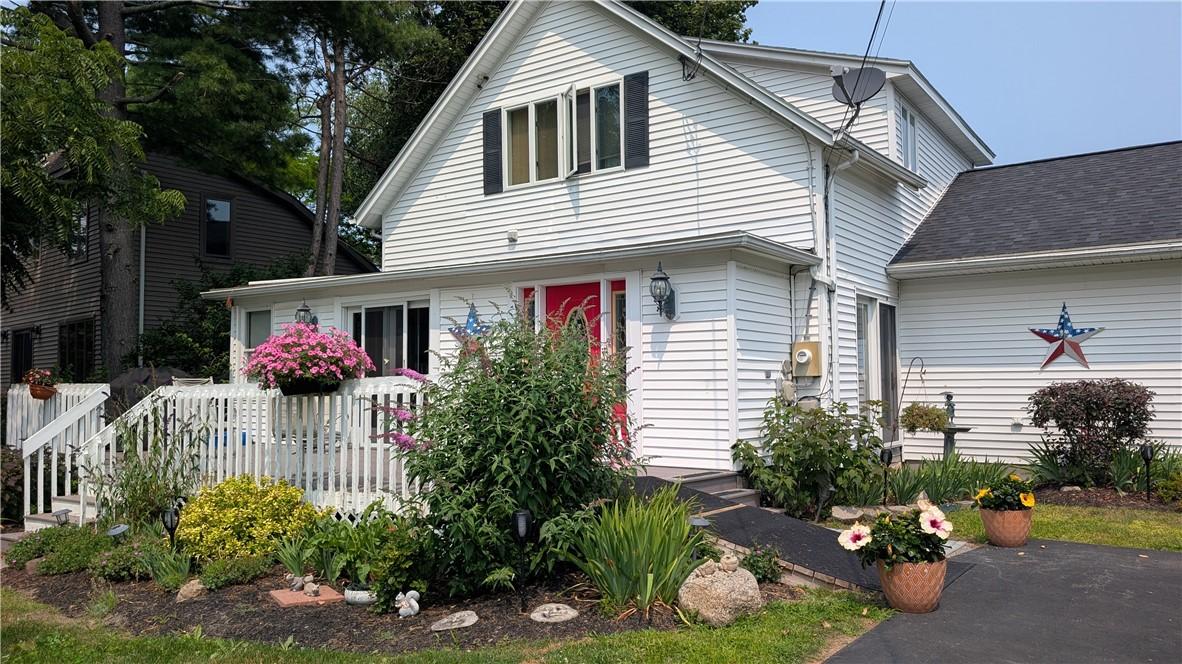 Image 3: Front entrance via ramp or stairs.  No-step access