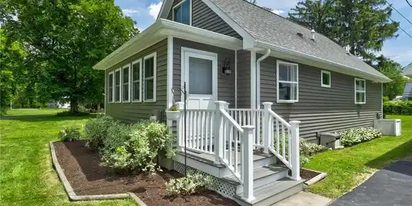 Image 2: Beautifully landscaped...composite decking and vin