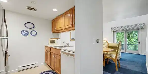 Image 2: Kitchen overlooking Dining/Living