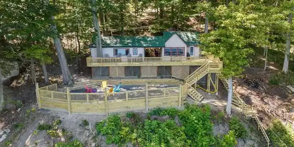 Image 2: Aerial - deck and firepit entertainment area.