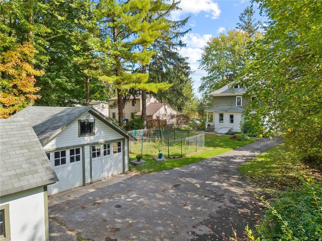 Image 4: The driveway is located on the southern side of th