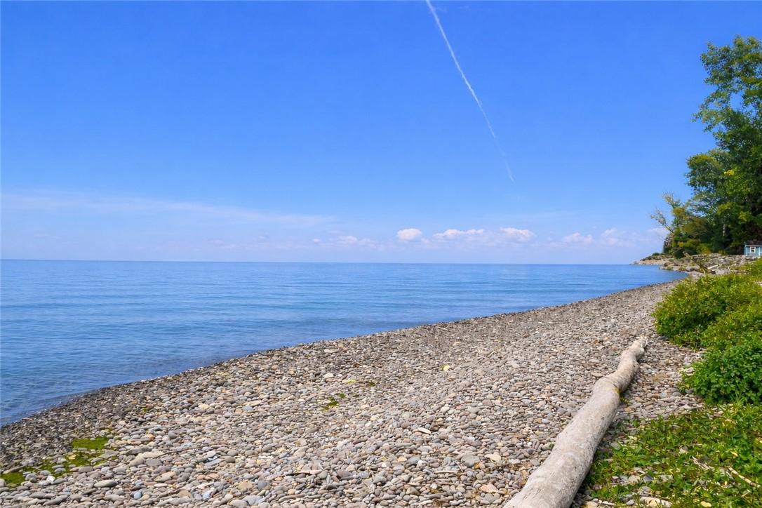 Image 2: PRIME PRIVATE ACRE WITH 115' STONE BEACH