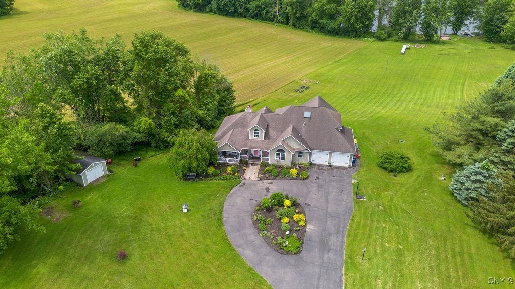 Image 1: Aerial view of the home