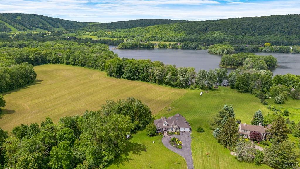 Image 2: The home has 120' of waterfront on Crooked Lake!