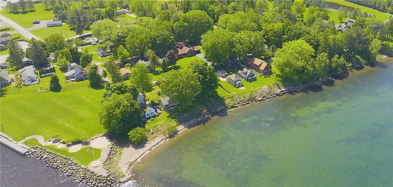 Image 4: View of the park and house from over the lake