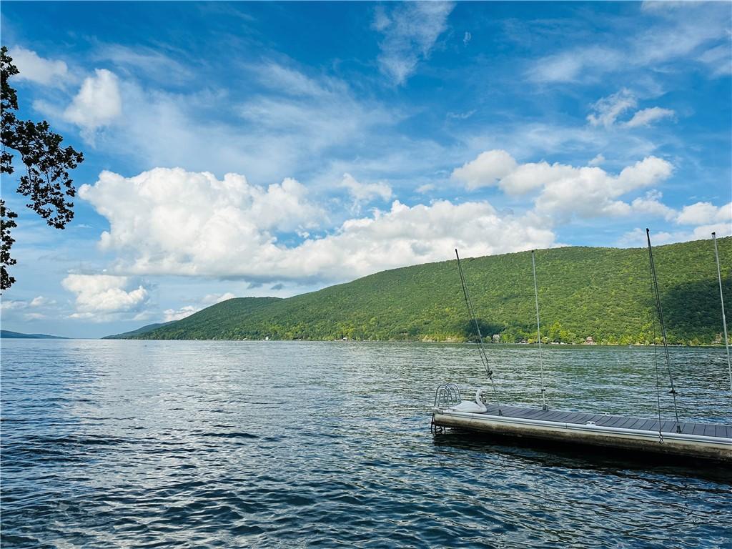 Image 4: View from stone patio by the water