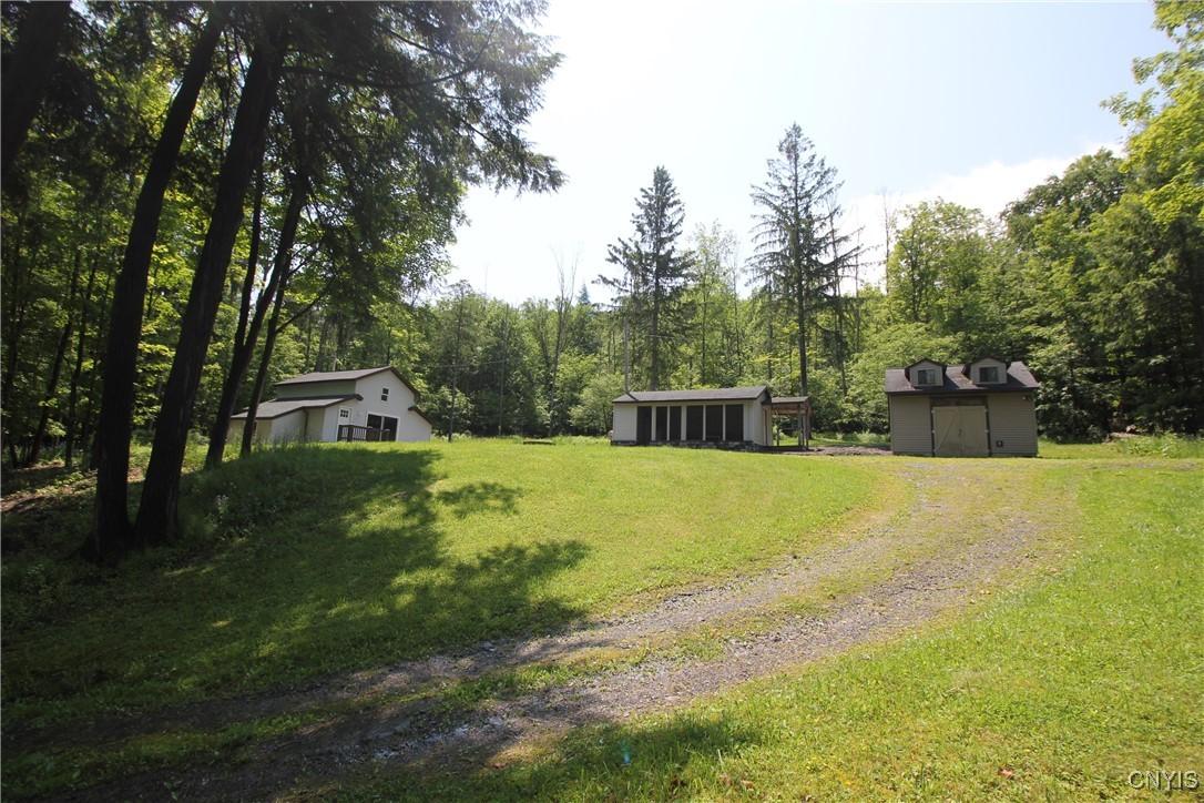 Image 3: Three structures, house, cabana and shed