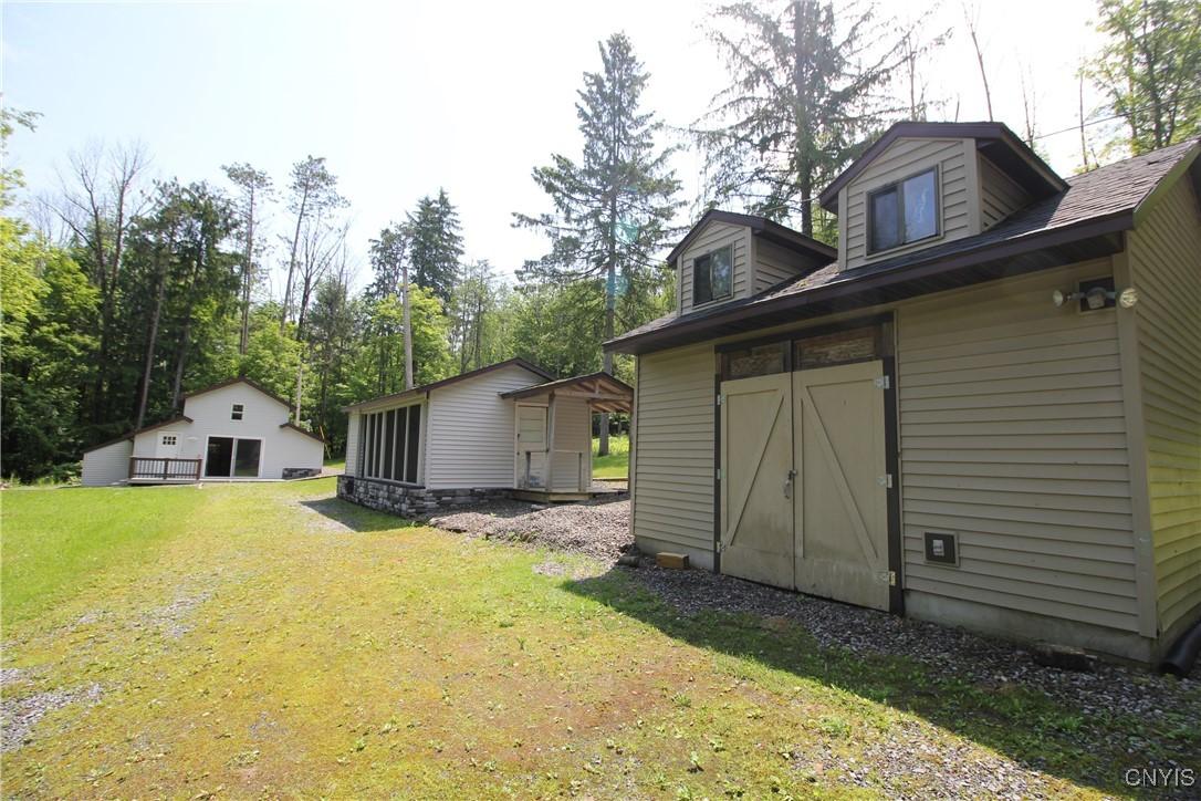 Image 4: Three structures, house, cabana and shed