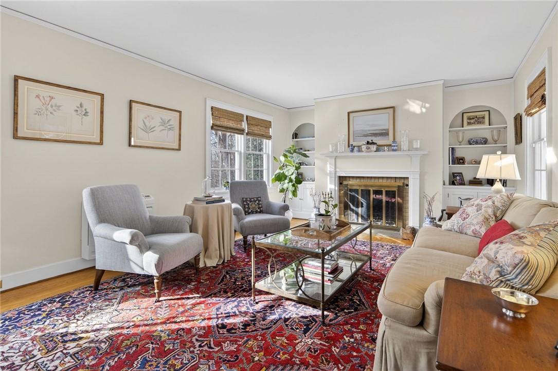 Image 4: living room with wood burning fireplace