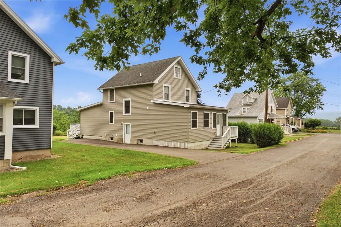Image 2: These 'sister' homes were built in the same era by