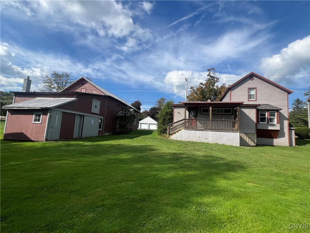 Image 3: back view of the property from the lake side