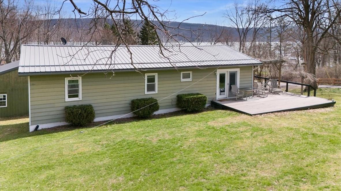 Image 2: Front of home with front deck