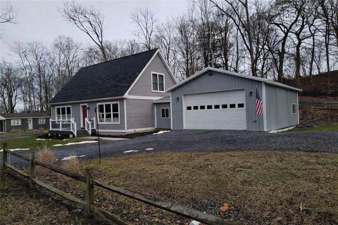 Image 2: Modern lake-area home with attached oversized gara