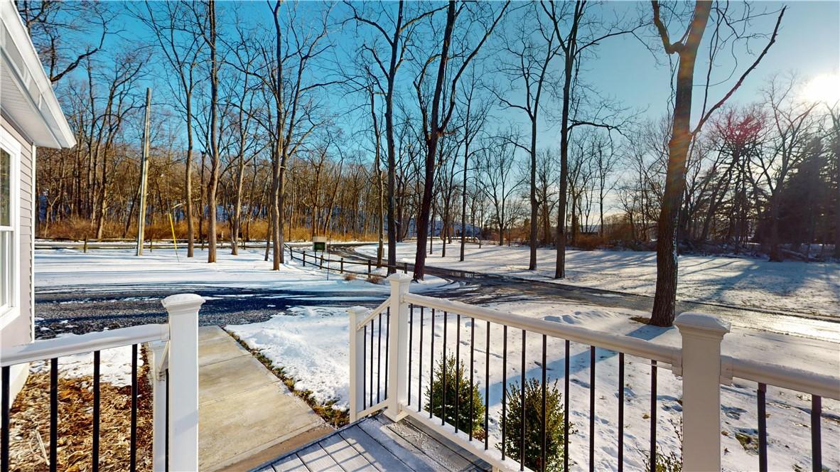 Image 3: Charming year-round home with snow-covered setting