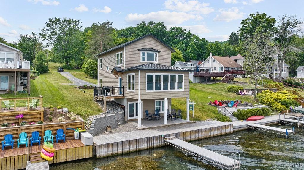 Image 1: Back of home - waterfront profile