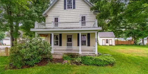 Image 2: Relax on the covered front porch.