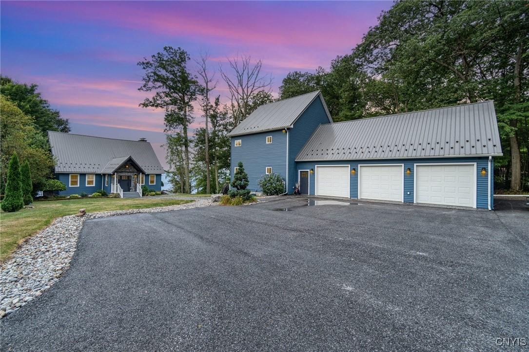 Image 1: Waterfront Home with Guest House and 3-Car Garage