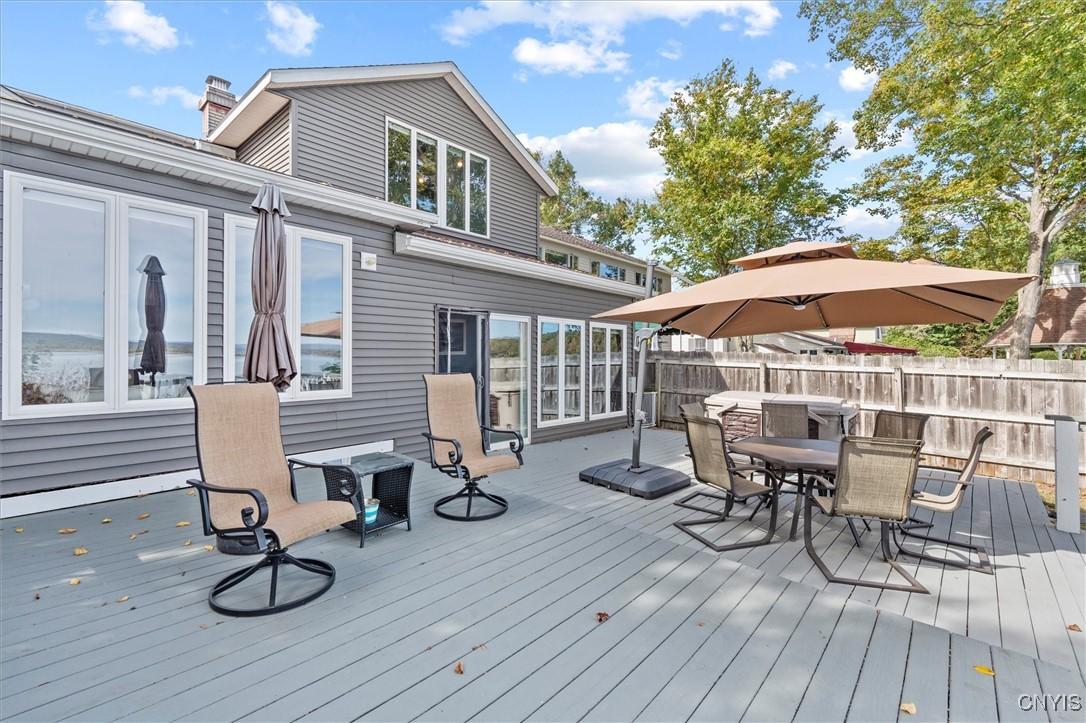 Image 2: Expansive lakeside deck with private dock&mdash;perfect