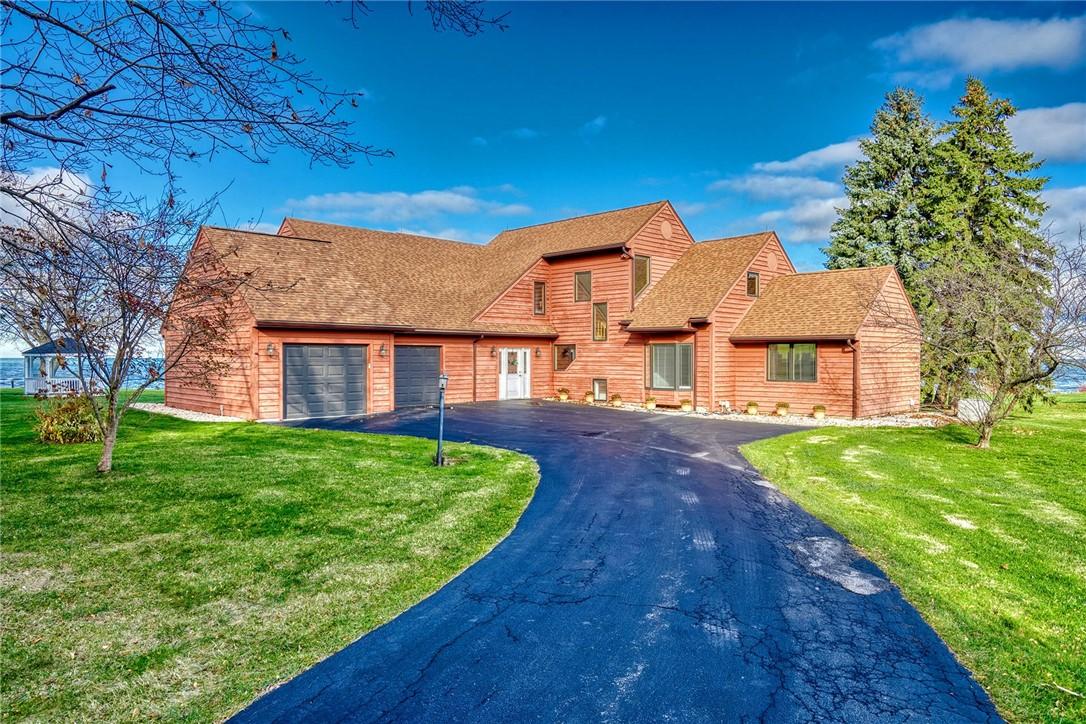 Image 4: Blacktop driveway leads to home, set back off of L