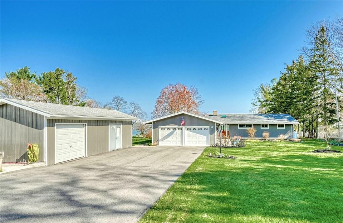 Image 2: Welcome to 147 Elm Dr ranch with additional garage