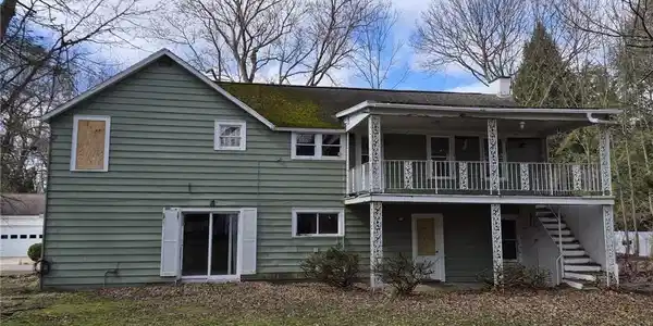 Image 2: Back of home
