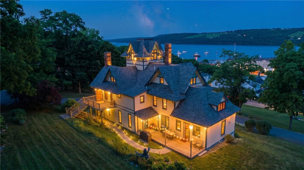 Image 3: Twilight View with Seneca Lake Backdrop &ndash; Stunning