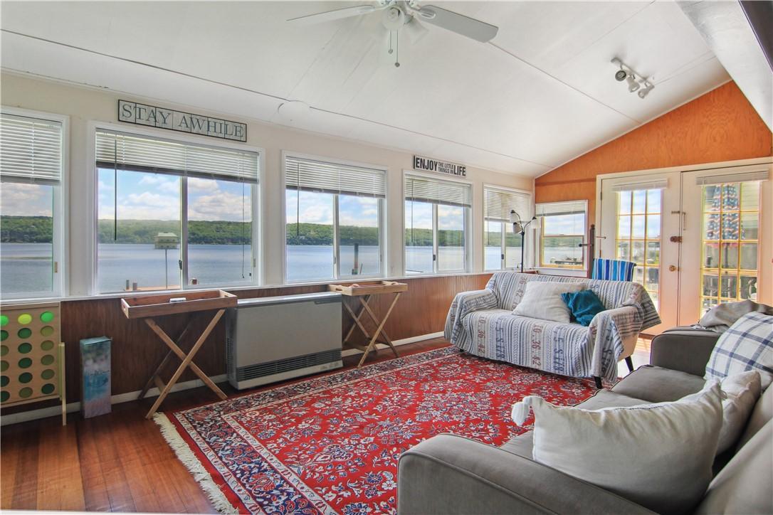 Image 3: Wall of windows in living room