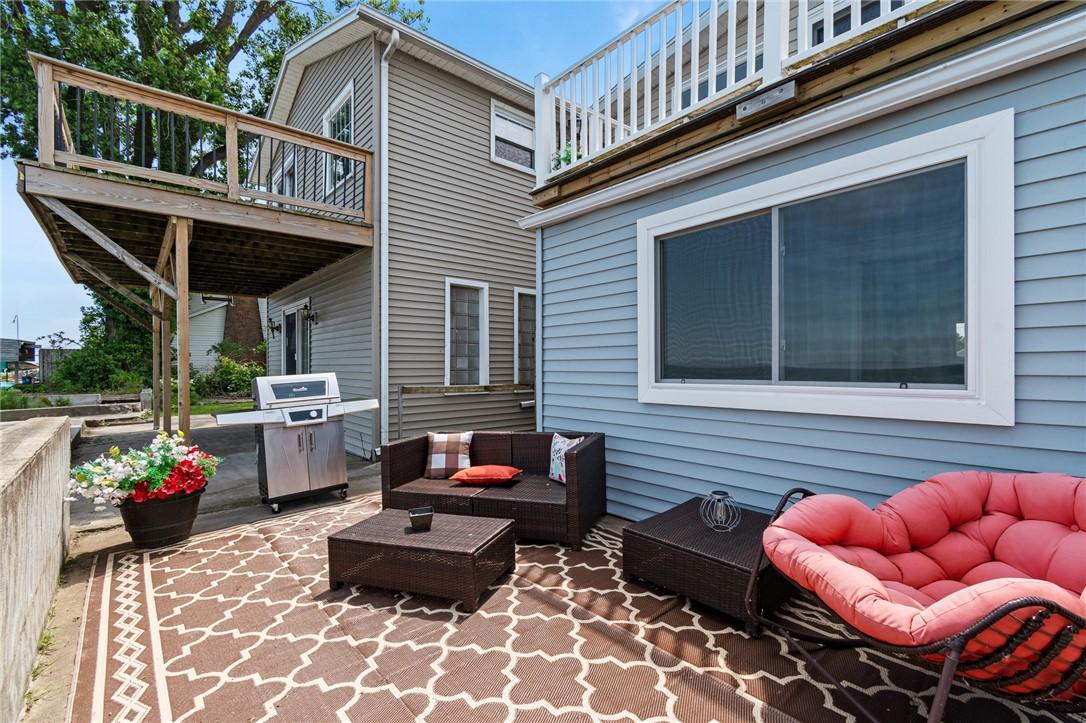 Image 4: The WATERFRONT PATIO- just imagine sitting here en