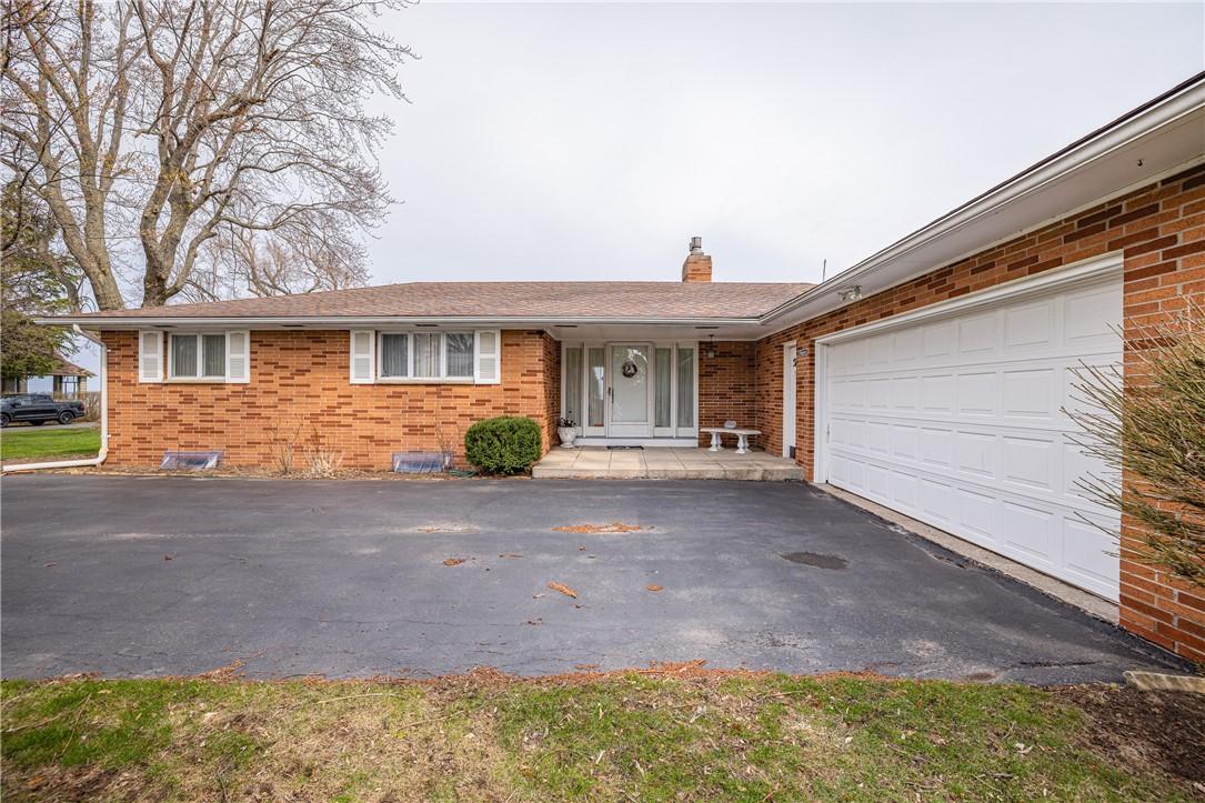 Image 3: Built by the original owner, this covered entry is