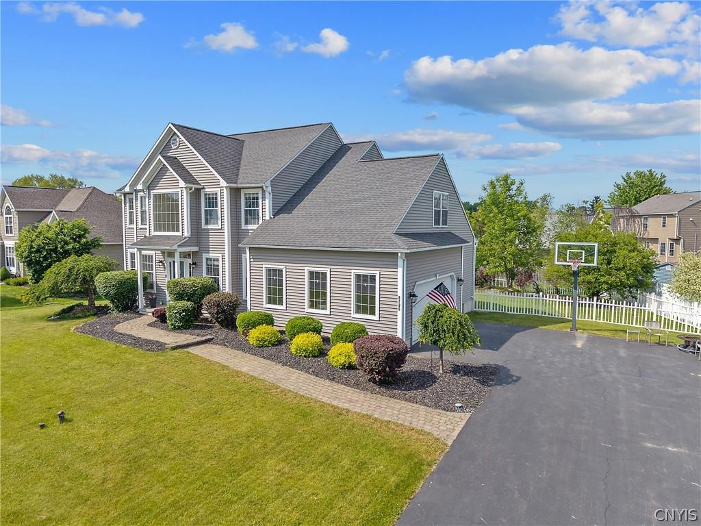 Image 3: Enter the home through the spacious 2+ car garage