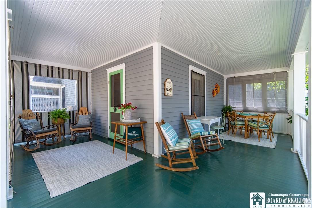 Image 2: Wraparound porch extends the living space to the o