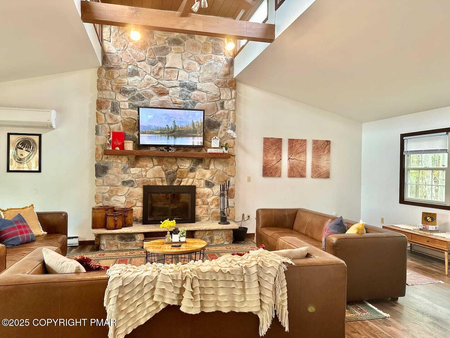 Image 2: living room with new updated firewplace