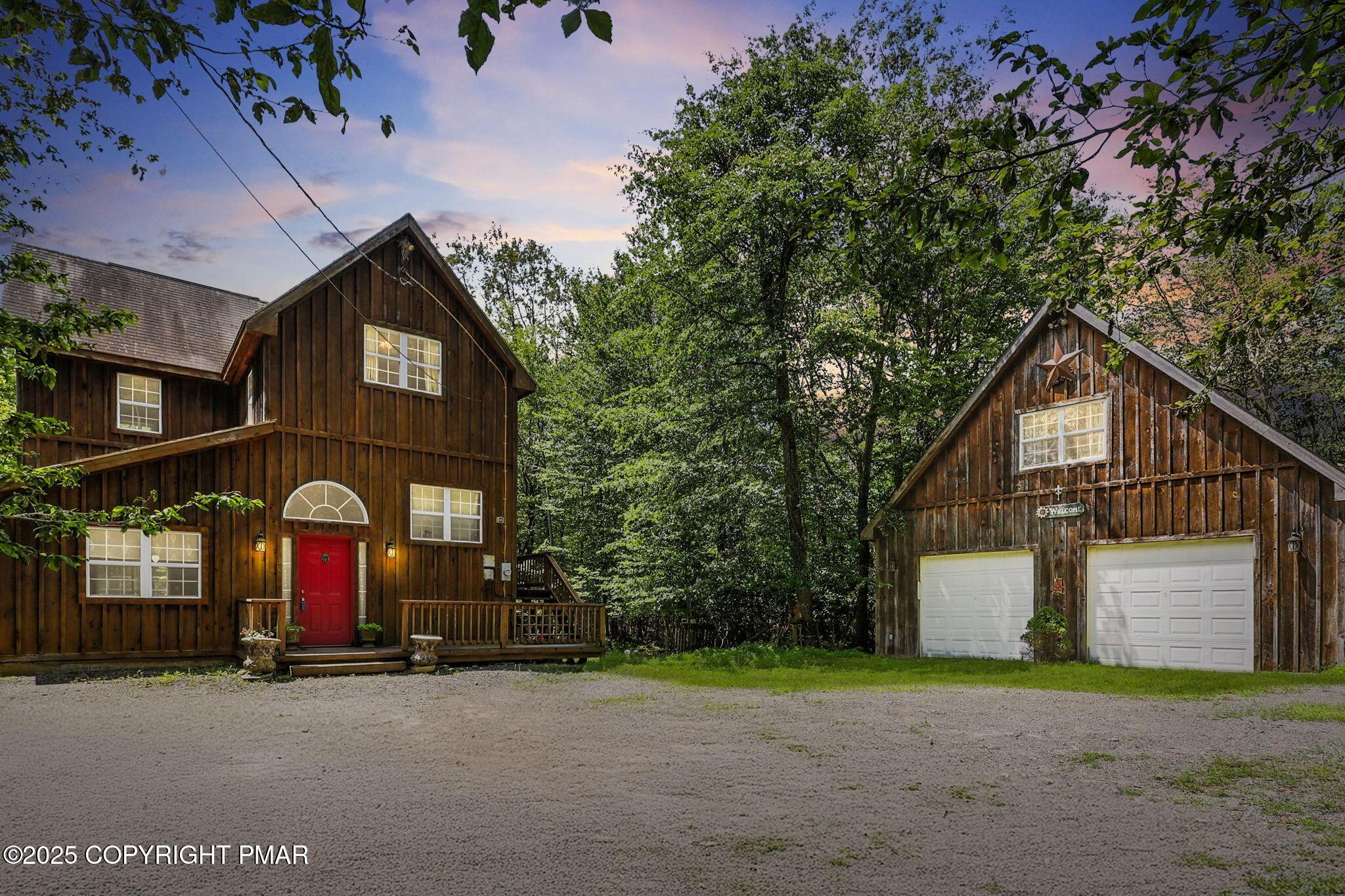 Image 1: front view with garage