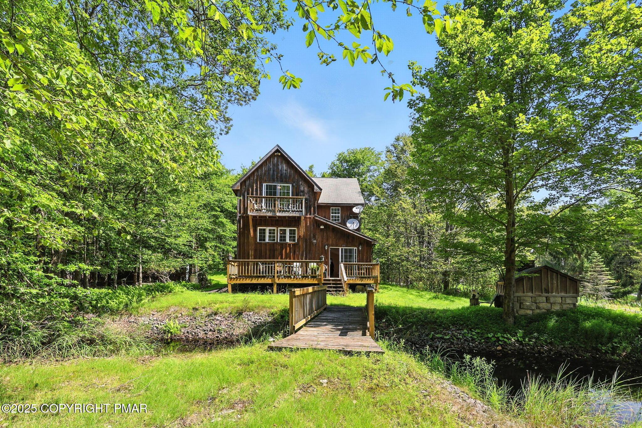 Image 4: pond view back of house