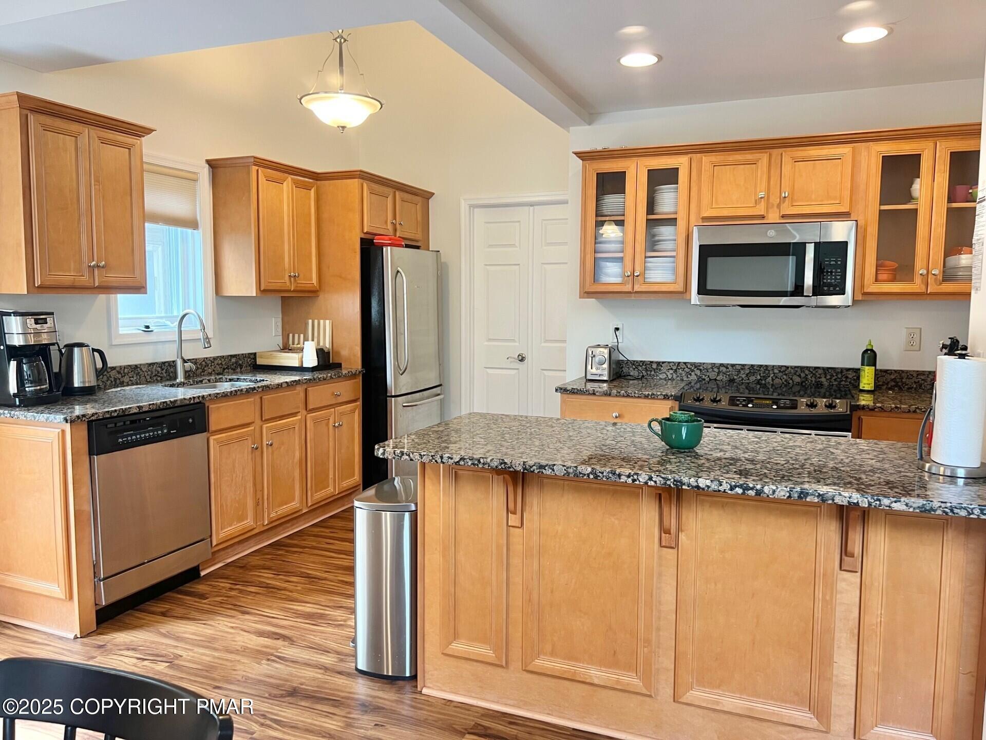 Image 4: kitchen has granite counters