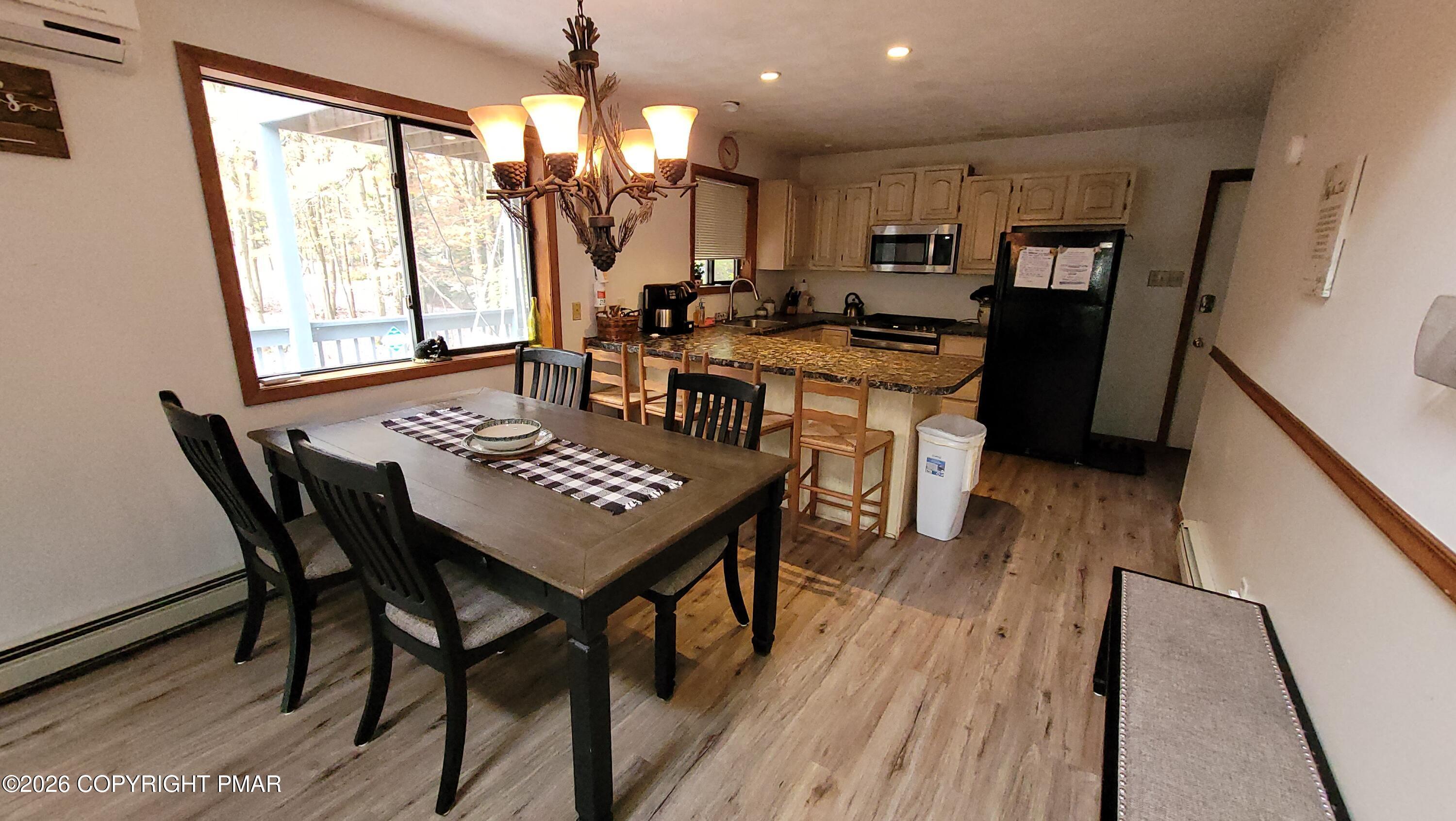 Image 3: Dining and kitchen