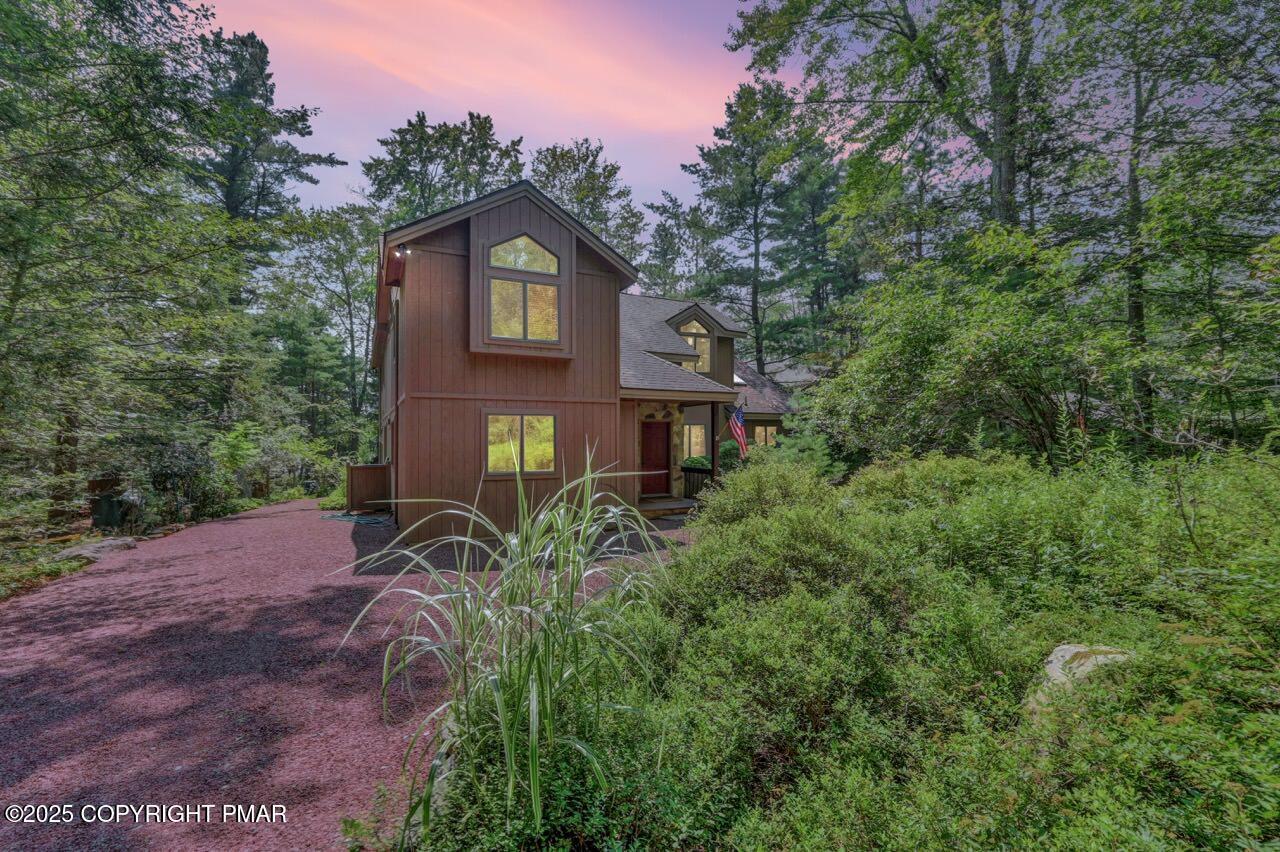 Image 3: 5120 Woodland Ave 01 Dusk Large