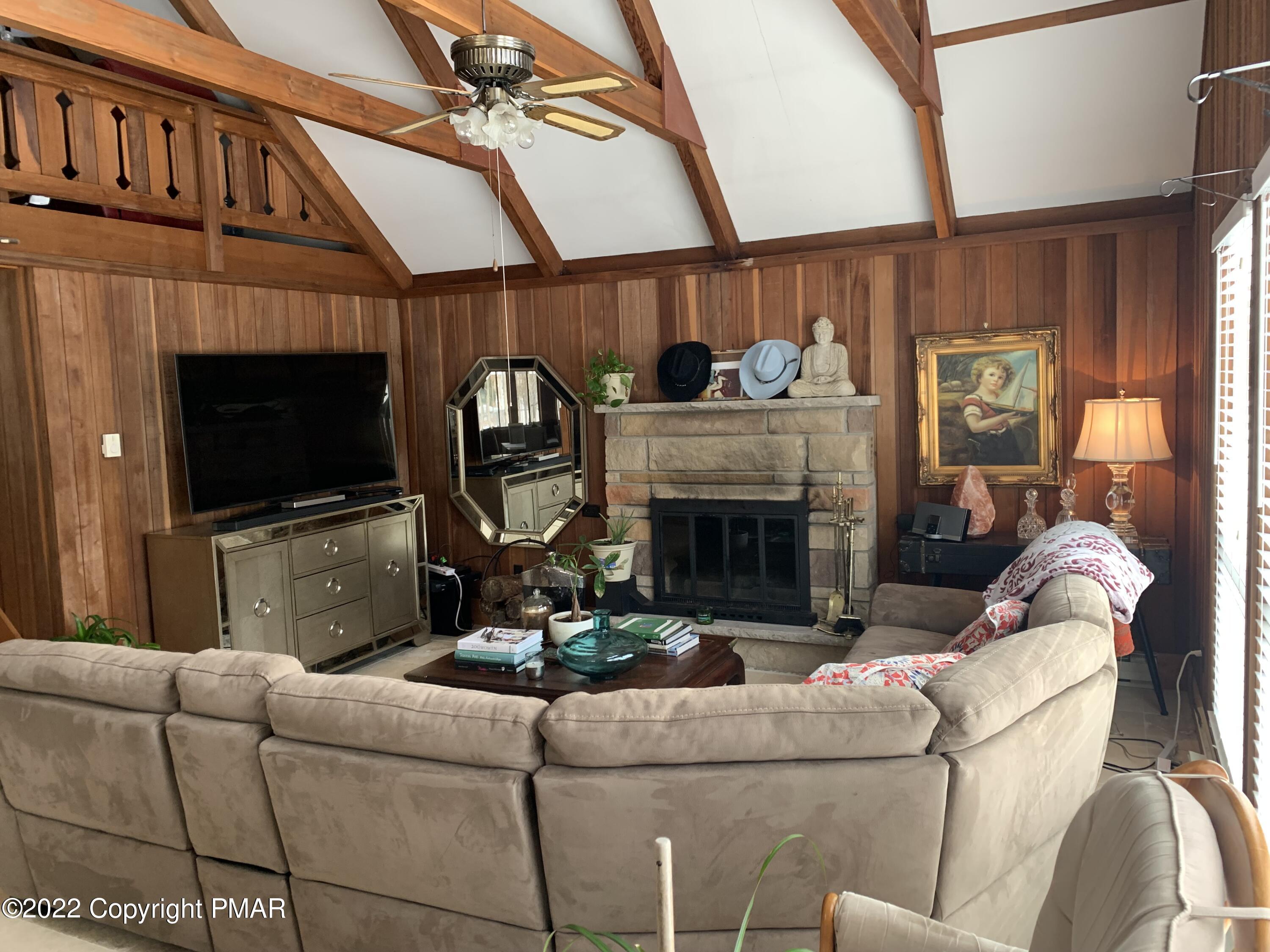 Image 3: fireplace in living room area