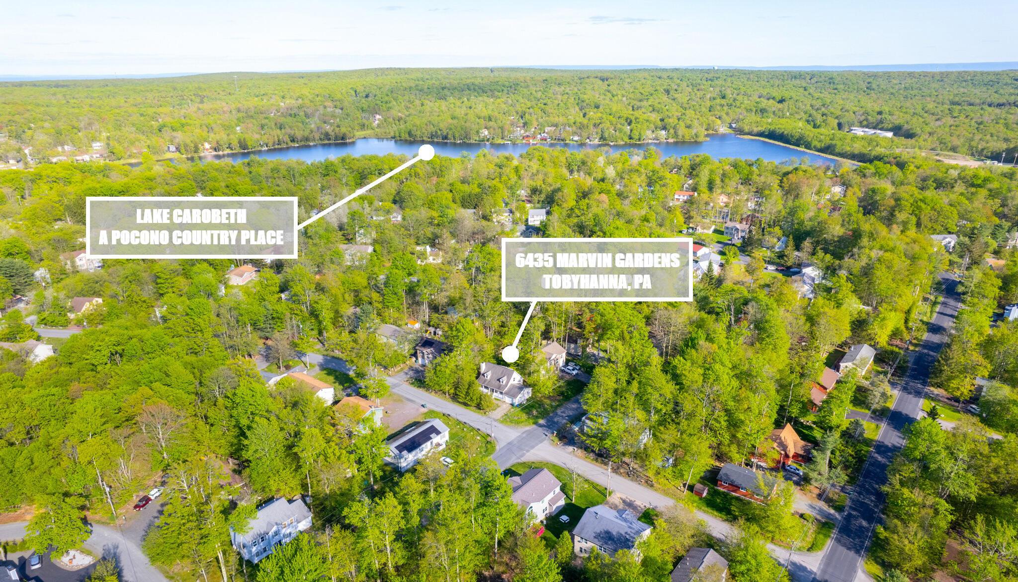 Image 3: Aerial Corner Lot by Lake