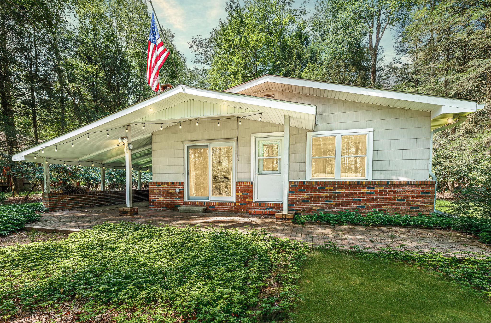 Image 1: Front of House Twilight