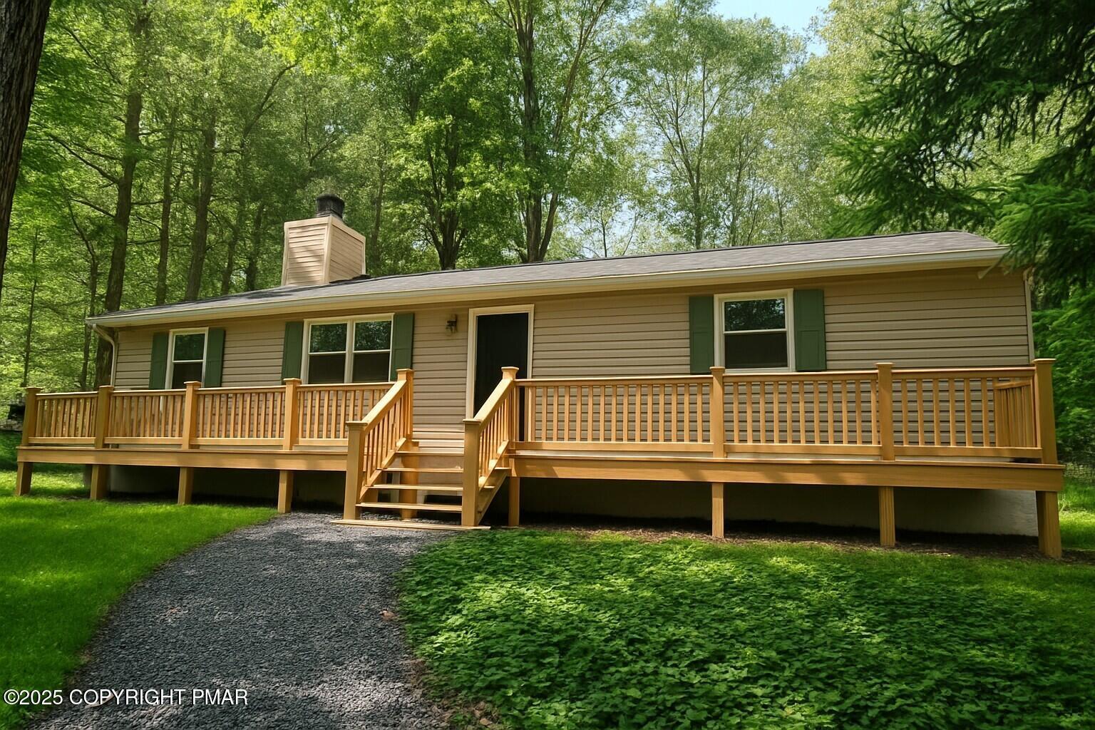 Image 3: Wooded Retreat with Cottage and Deck