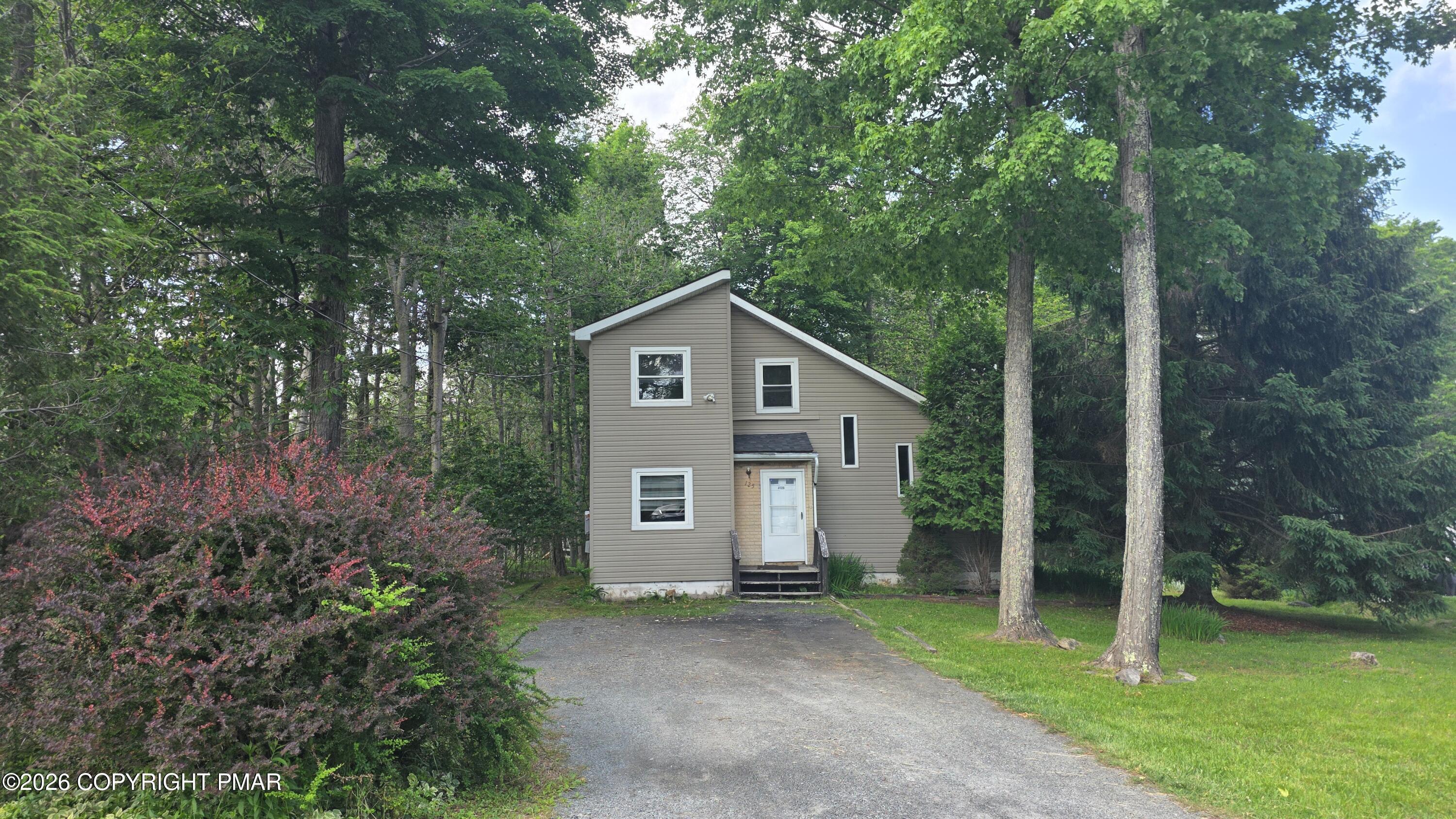 Image 2: front from end of driveway