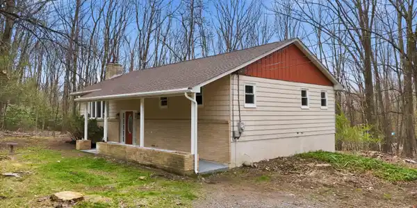 Image 3: House side view